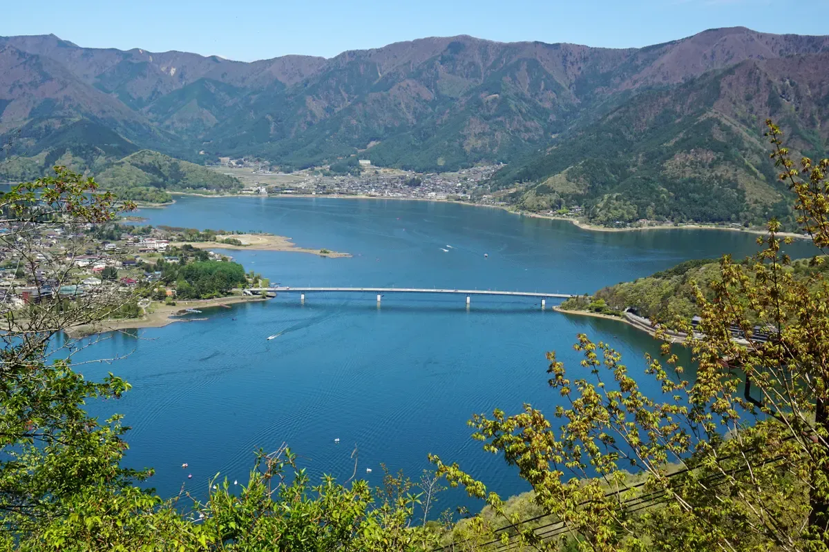Lake Kawaguchi and its bridge seen from above on a day trip from Tokyo