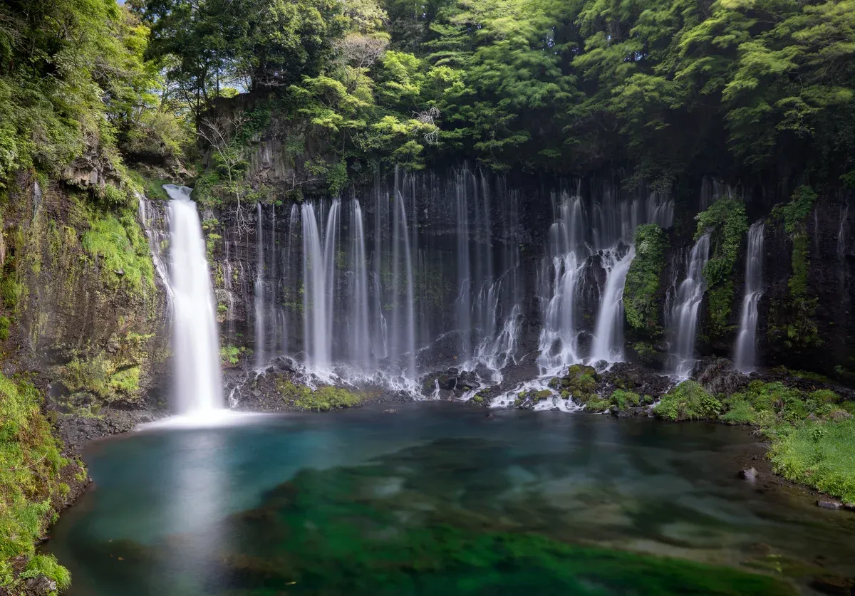 Shiraito Falls and its turquoise pool near Mt Fuji on a private Mt Fuji day tour from Tokyo