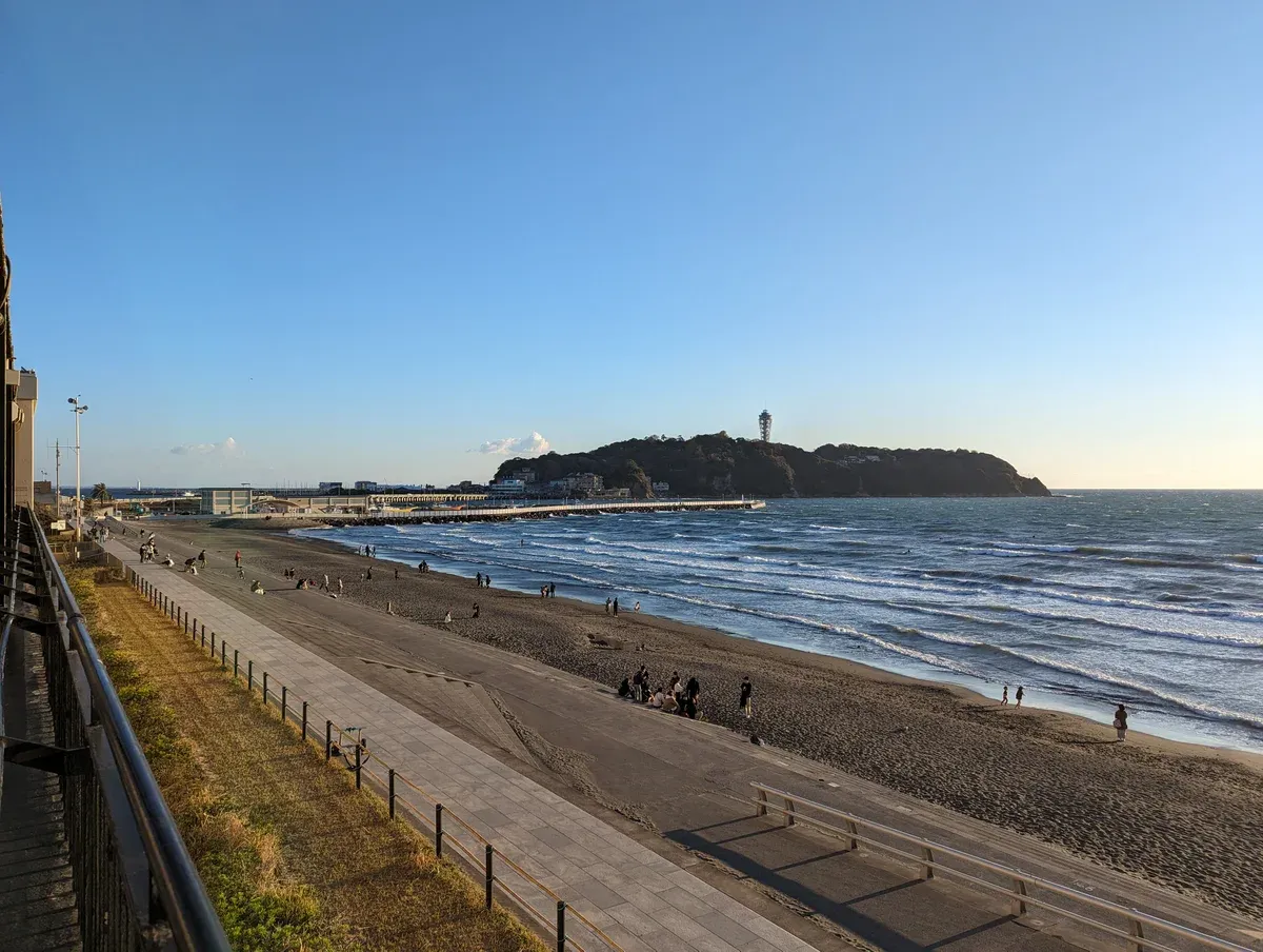 Enoshima island seen from Katase beach on a Kamakura and Enoshima day tour from Tokyo